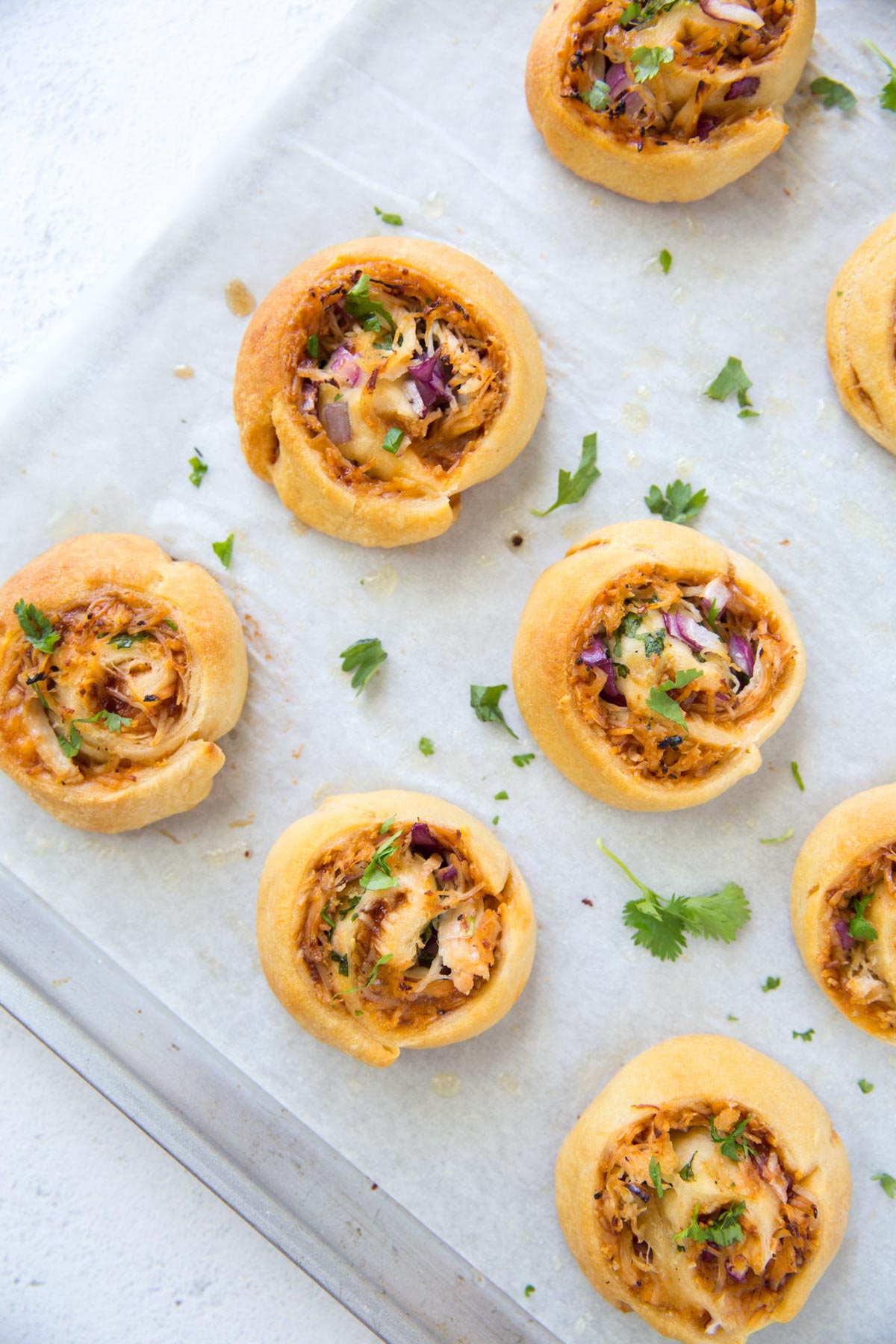 chicken pizza rolls on a baking sheet