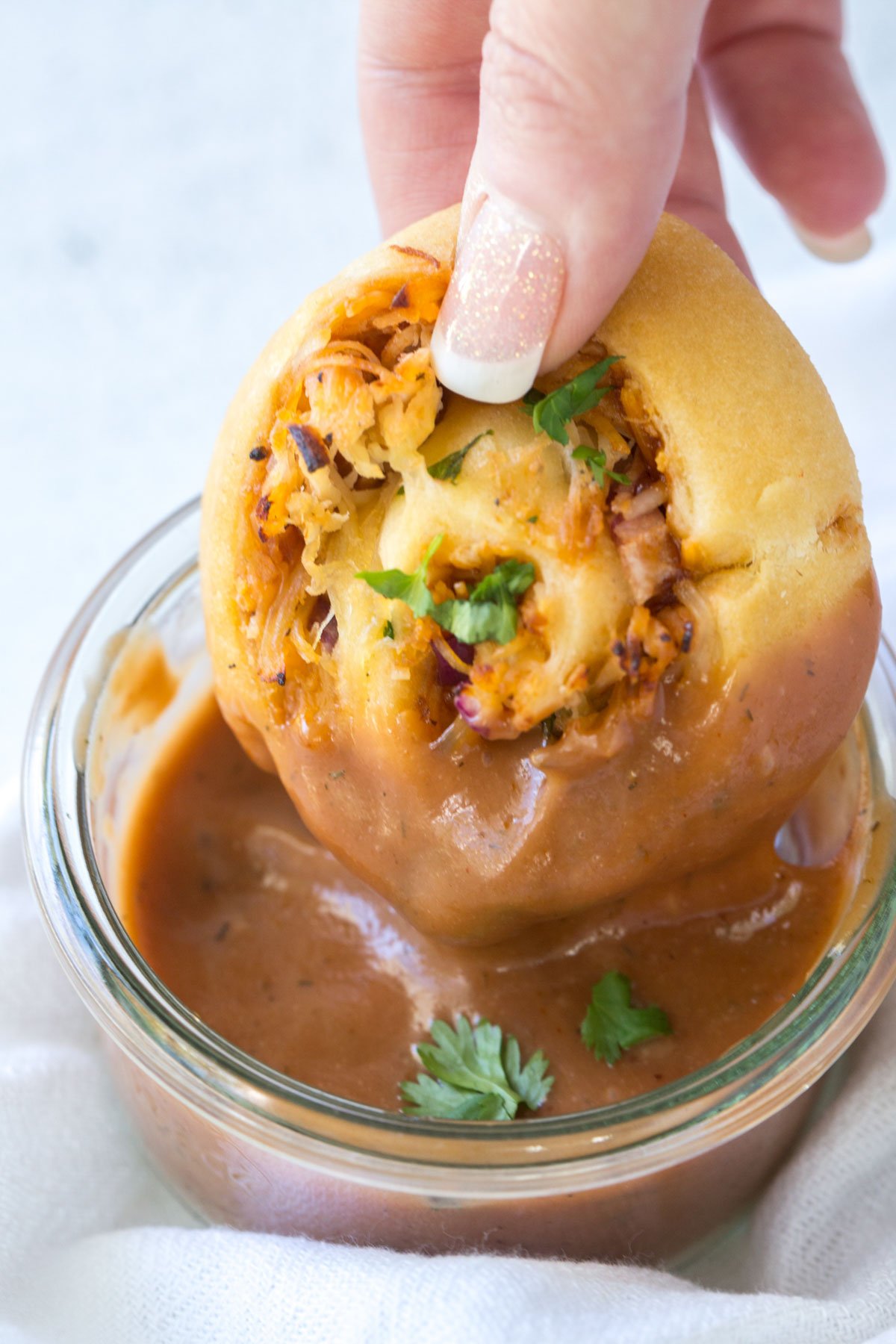 bbq chicken pizza roll dipped in bbq sauce