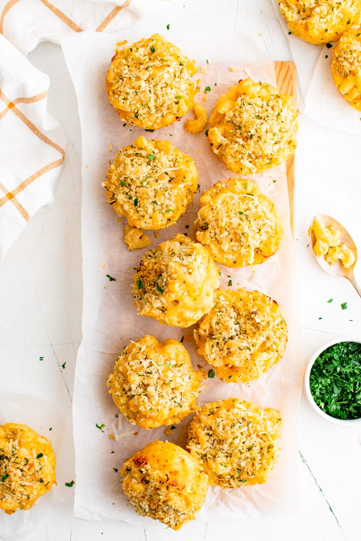baked mac and cheese bites on a white platter
