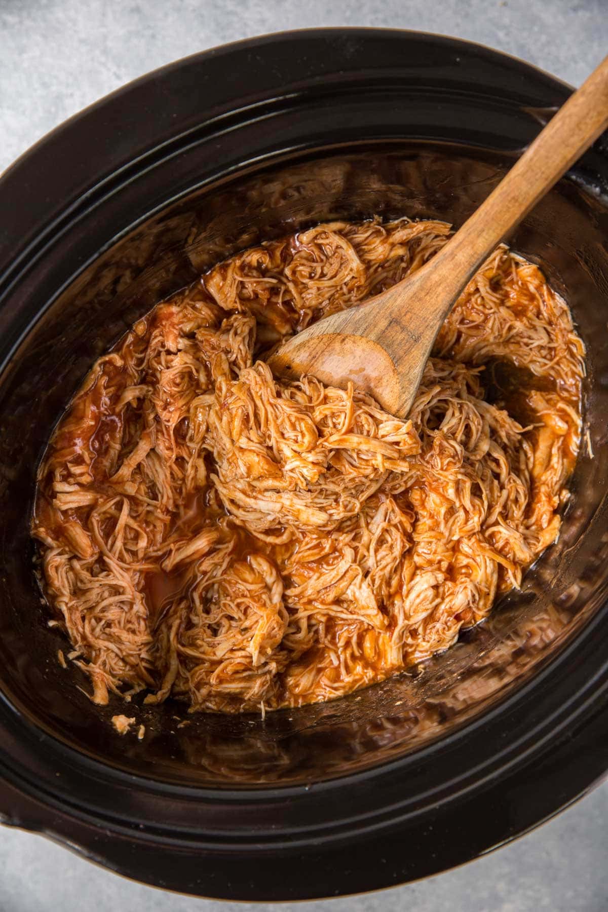 shredded chicken with bbq sauce in a crockpot