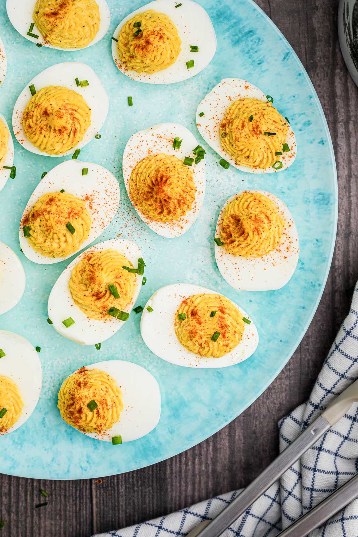 deviled eggs on a turquoise plate