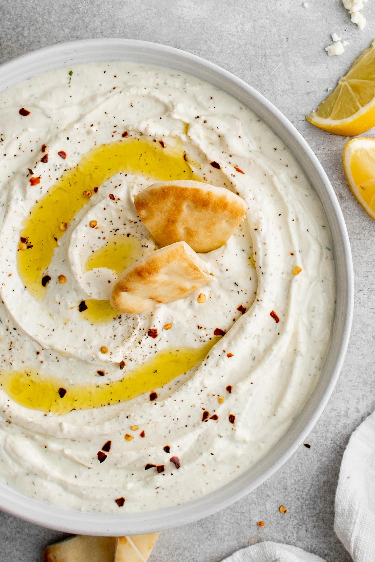 lare bowl of whipped feta dip with olive oil