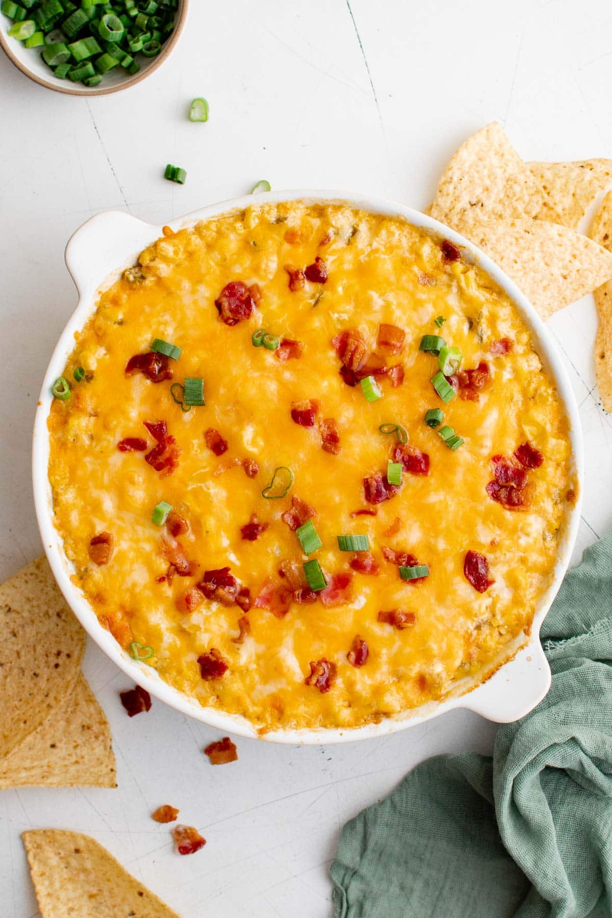 loaded corn dip baked in a white dish
