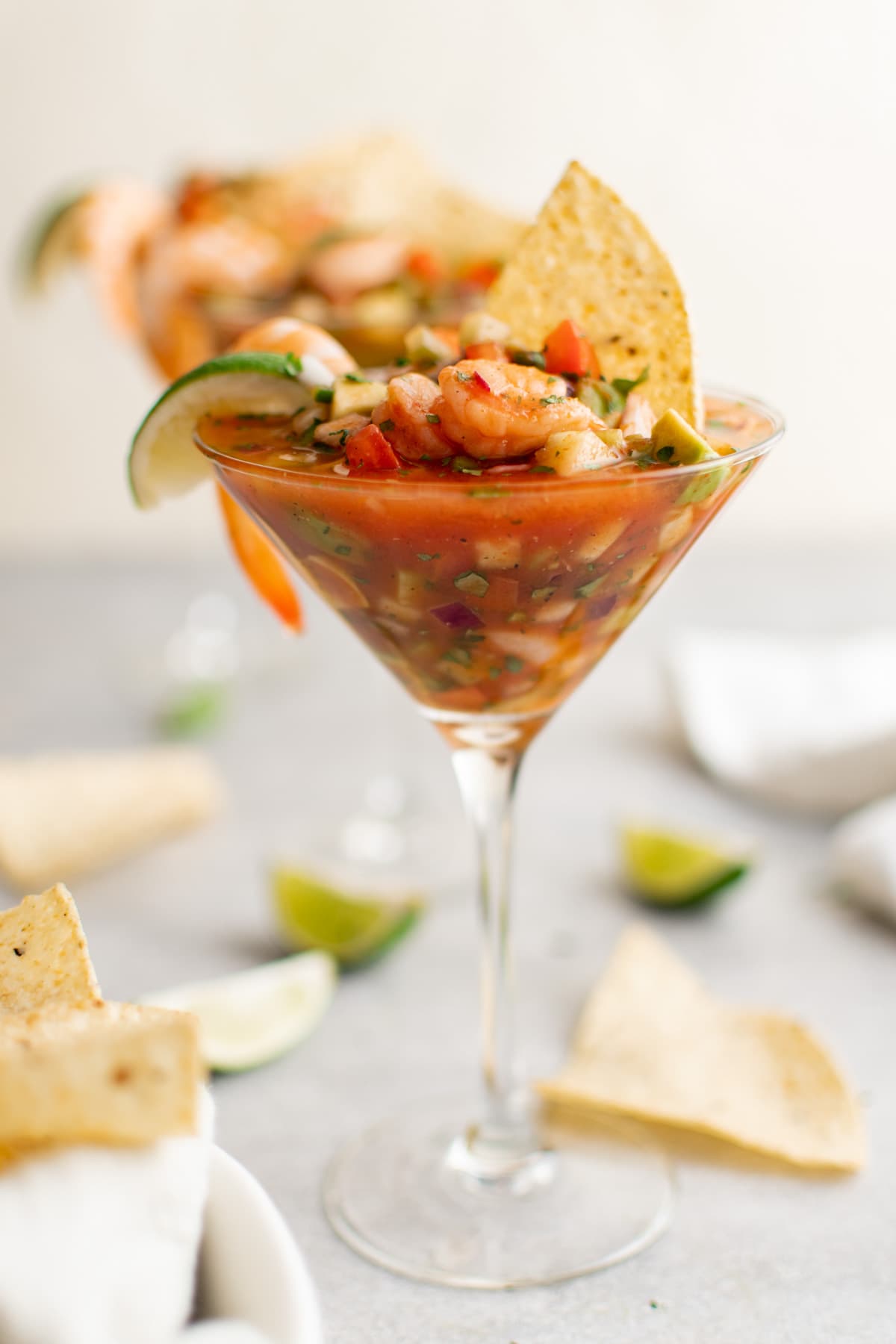 mexican shrimp cocktail in a lgass with a tortilla chip