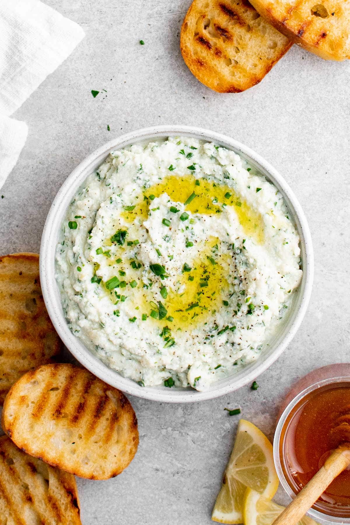bowl of whipped ricotta with olive oil