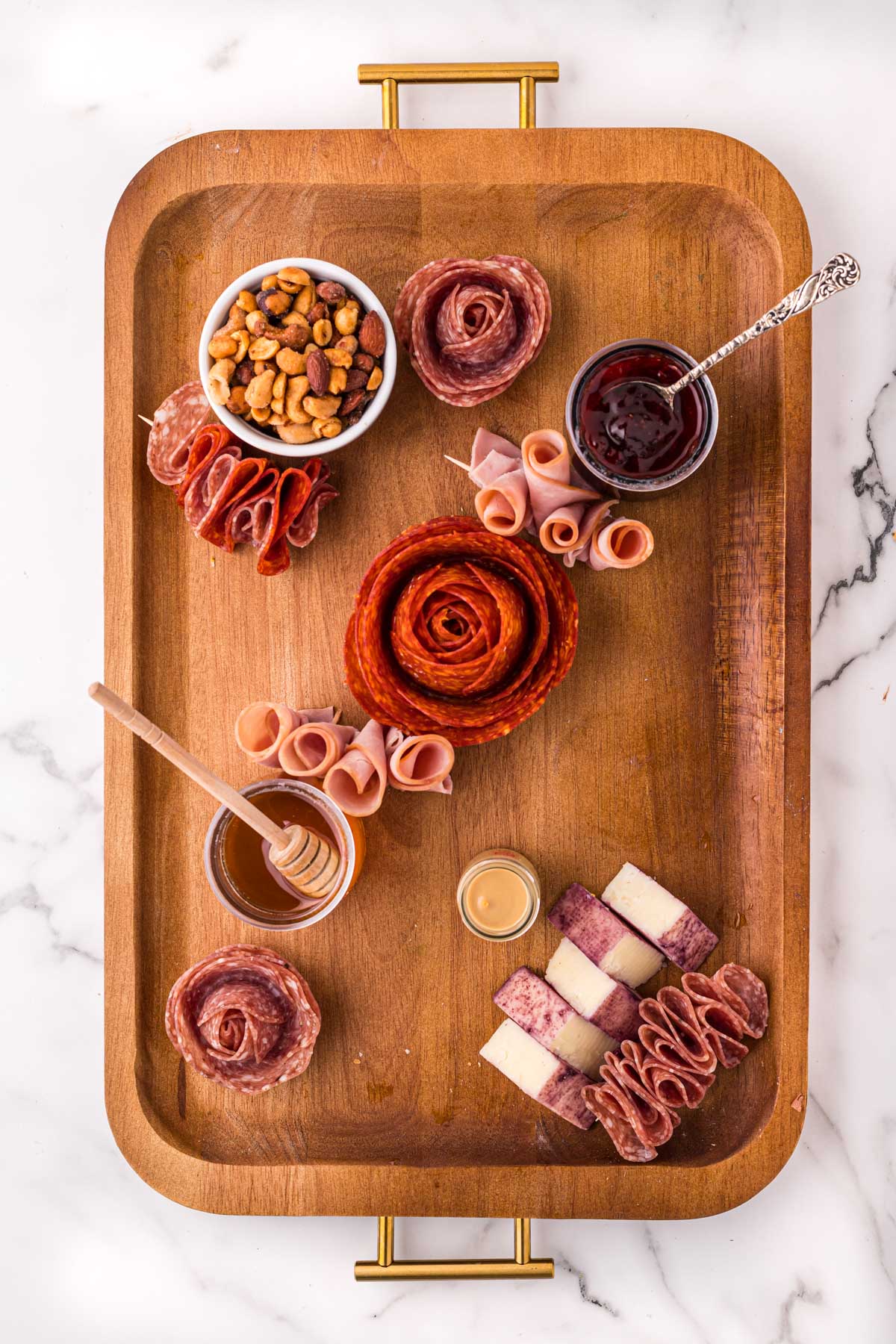 board with meat and spreads