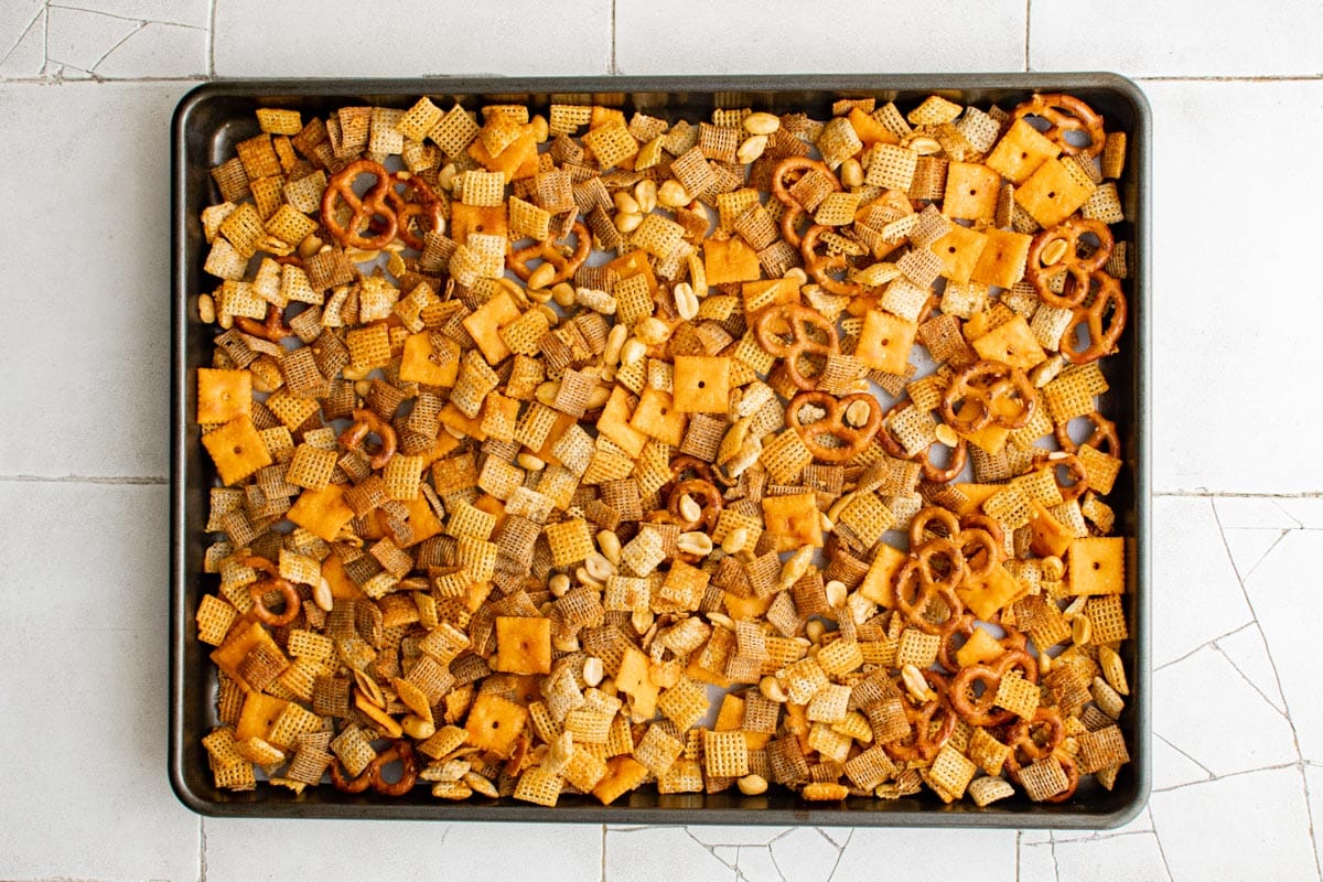 uncooked chex mix on a sheet pan
