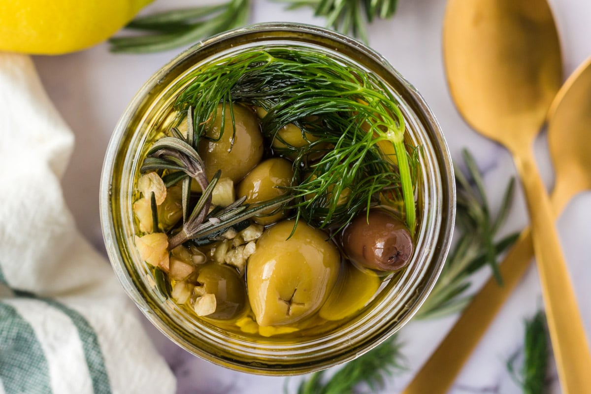 A jar of marinated olives.