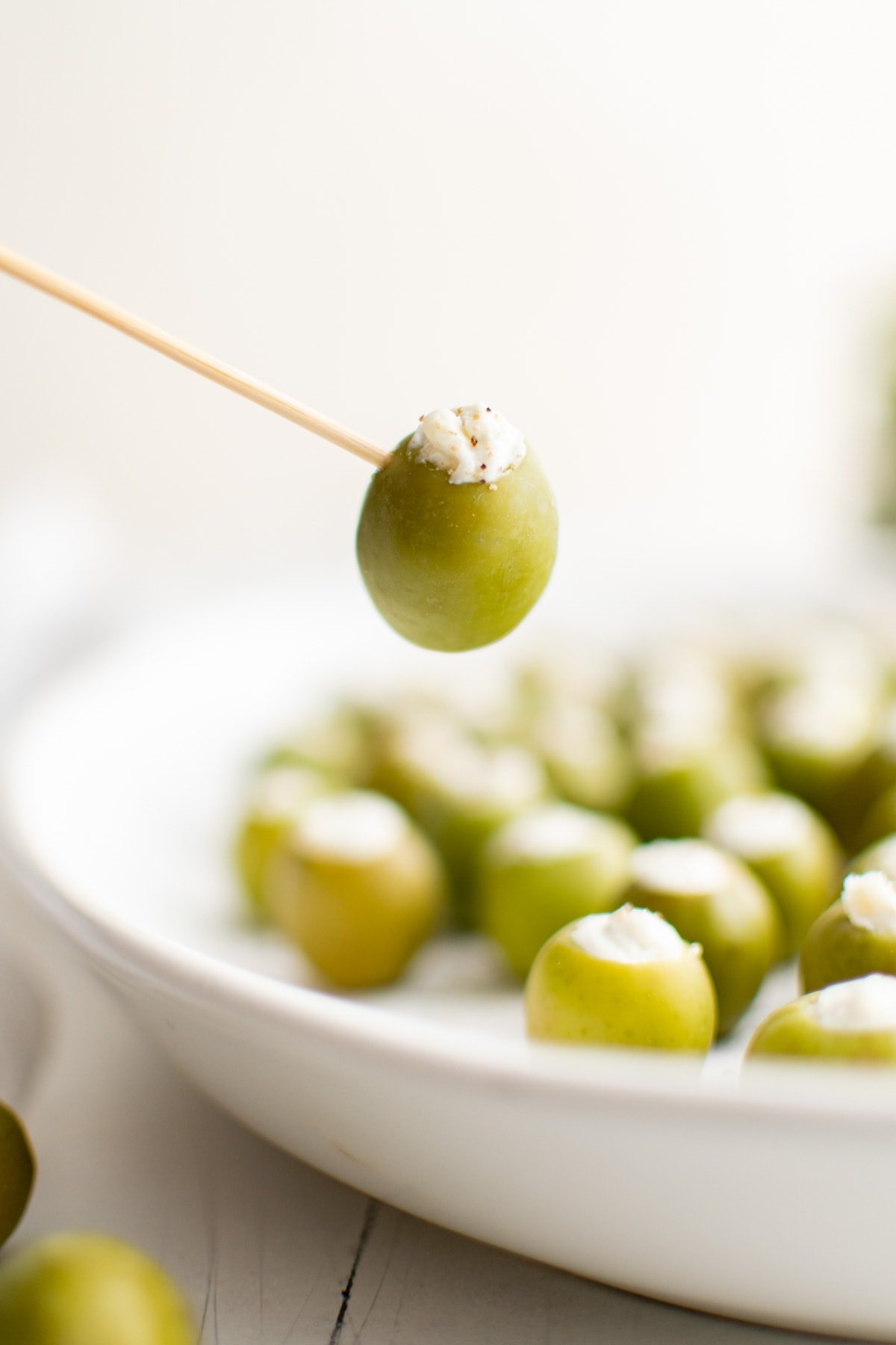 Blue cheese olives on a toothpick. 