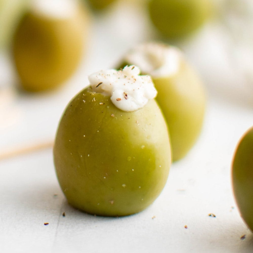 https://easyappetizers.com/wp-content/uploads/2022/05/Blue-Cheese-Stuffed-Olives-social.jpg