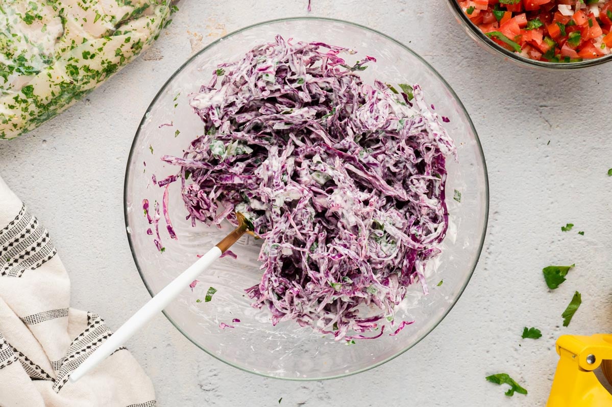 Purple cabbage slaw in a bowl.