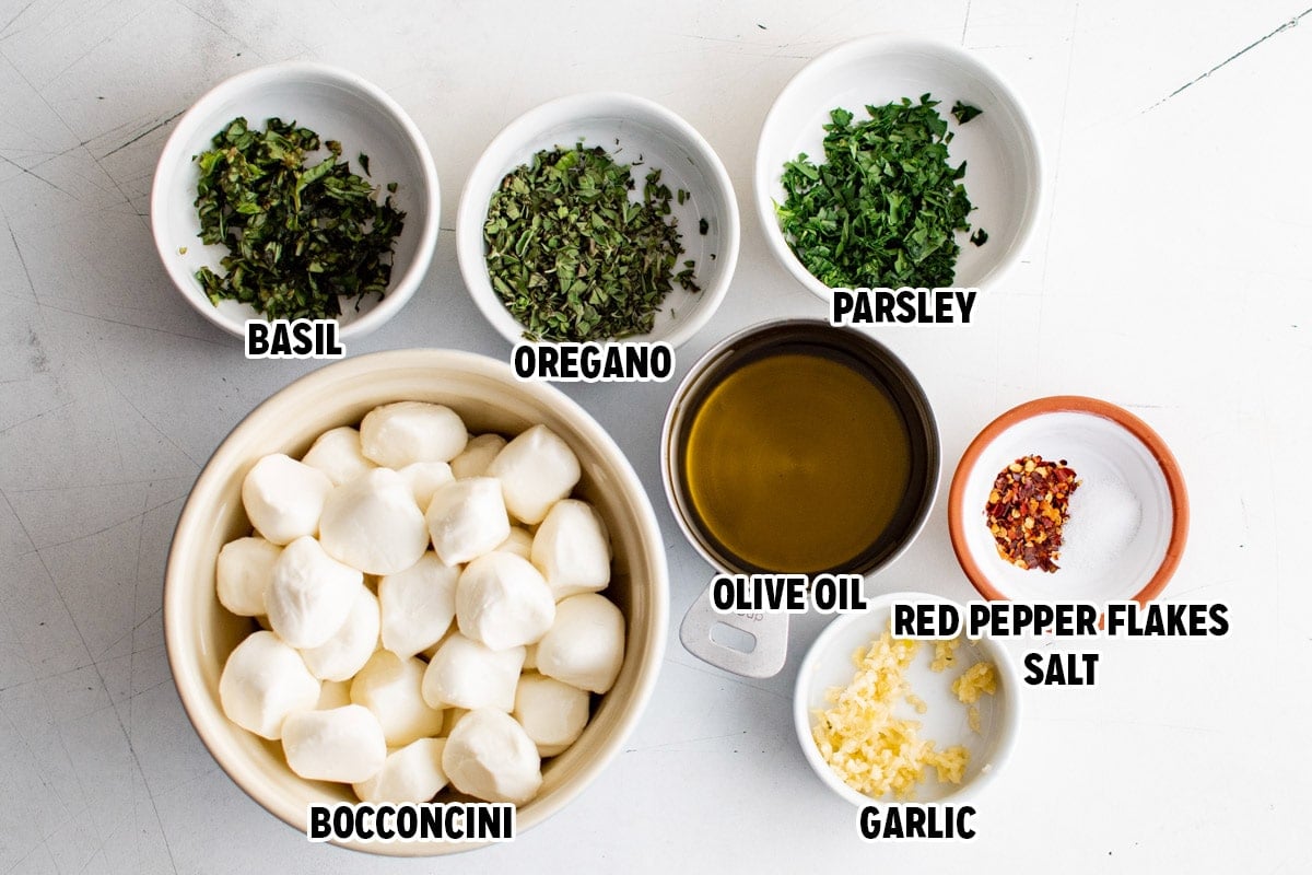 Ingredients for marinated mozzarella balls. 