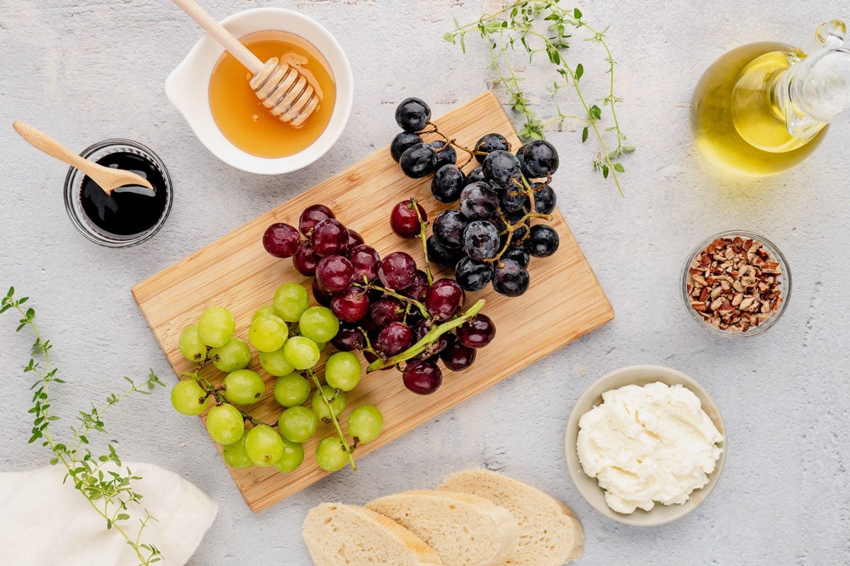 Ingredients needed for roasted grapes and crostini.