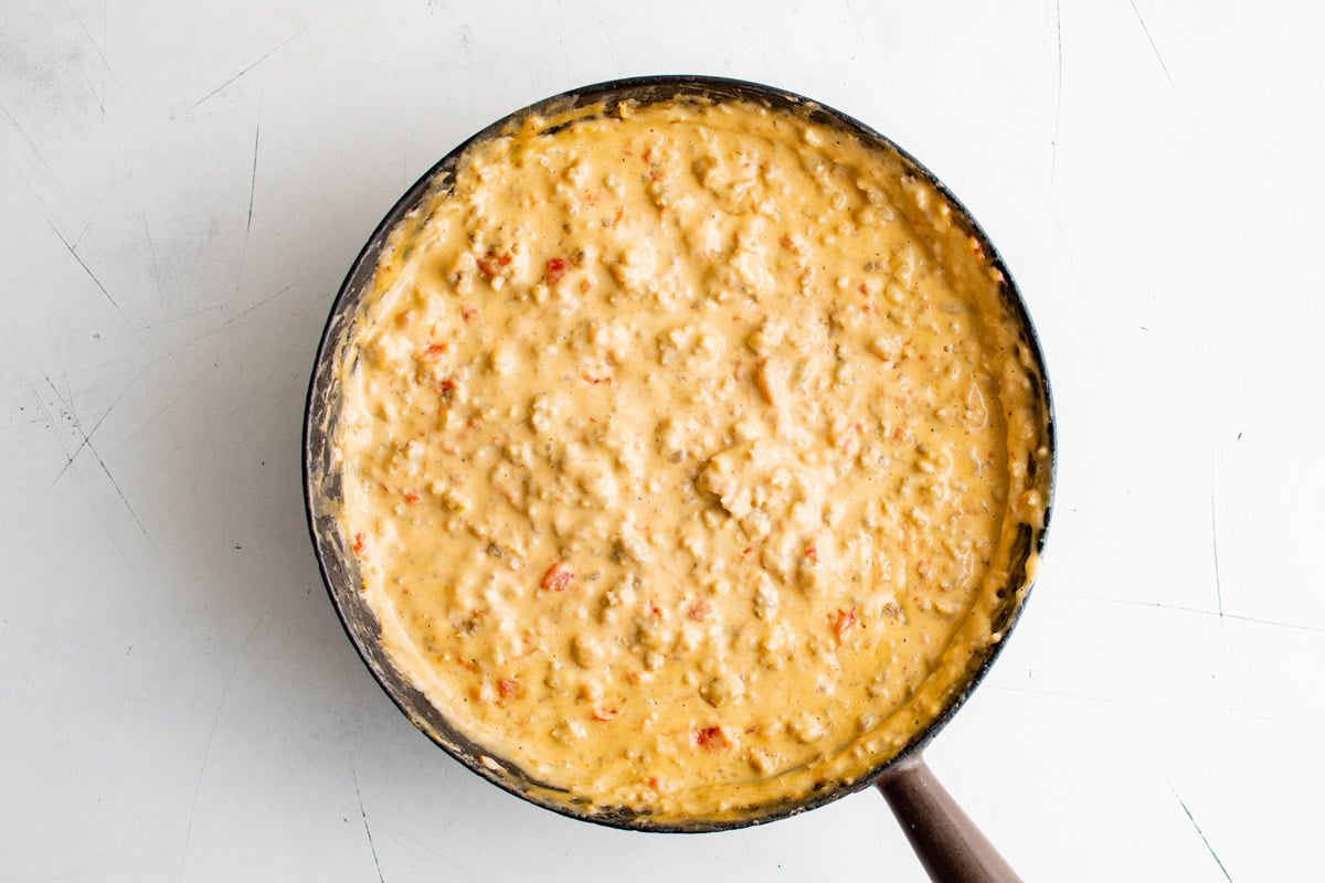 Chili dip in a skillet.